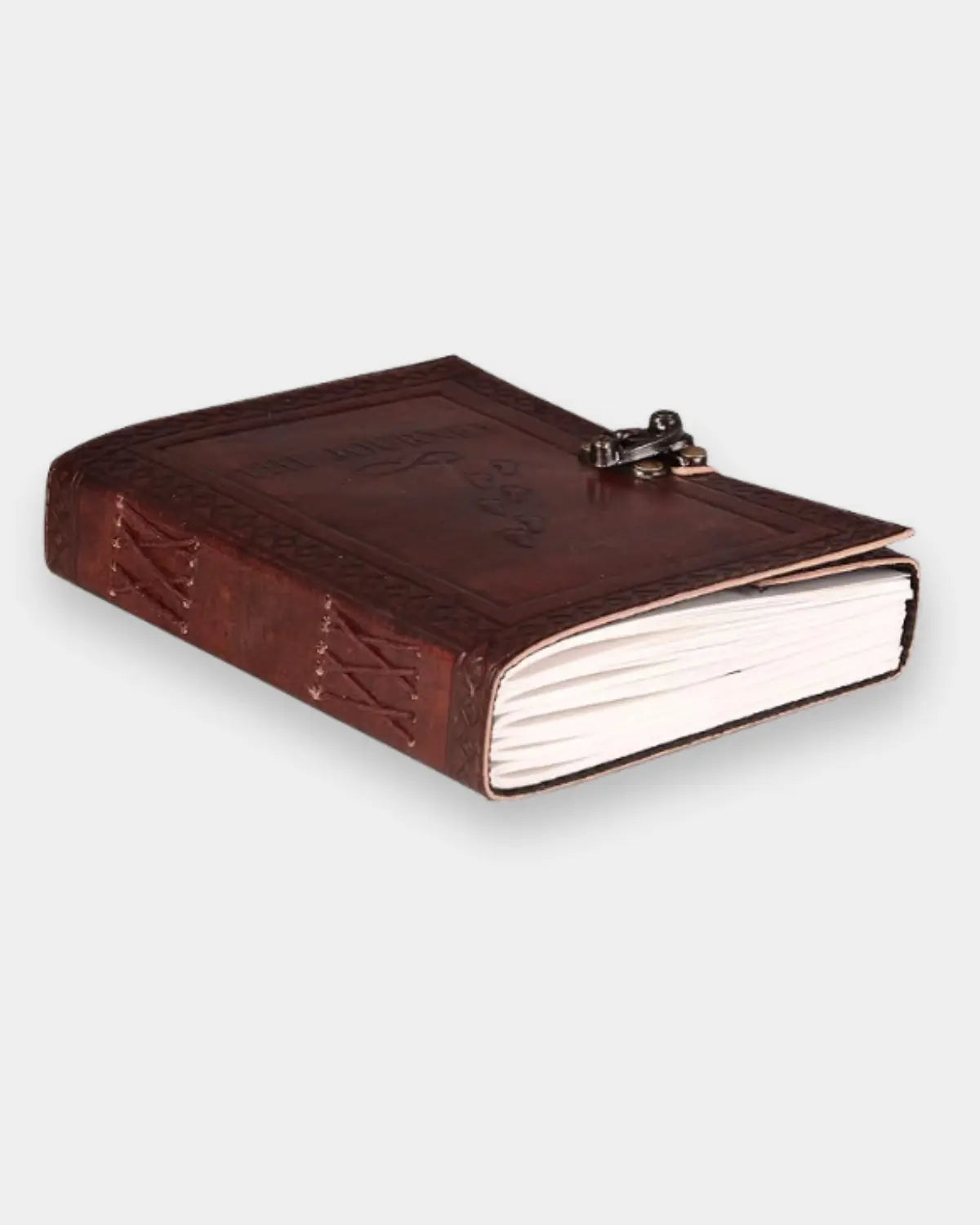 LAMAKHA The Journey vintage leather journal spine view — hand laced stitching, diamond tooled border, antique brass clasp locking diary with key, handmade leather diary