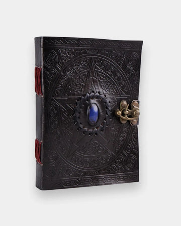 LAMAKHA gemstone black leather journal angled view lapis lazuli blue stone journal, Celtic pentagram embossing, antique brass clasp, red Coptic stitching, Leather diary vintage notebook for sketching