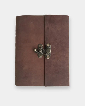 Rustic leather notebook and leather bound journal crafted from full grain buffalo leather diary for travel and journaling