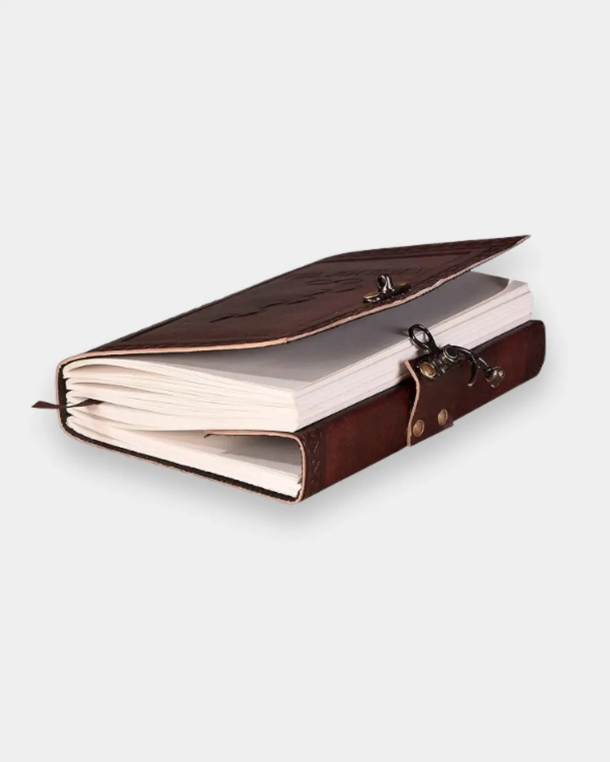 LAMAKHA The Journey leather diary sketchbook open showing deckle edge handmade pages of travel diary— antique brass clasp detail, genuine leather journal with lock